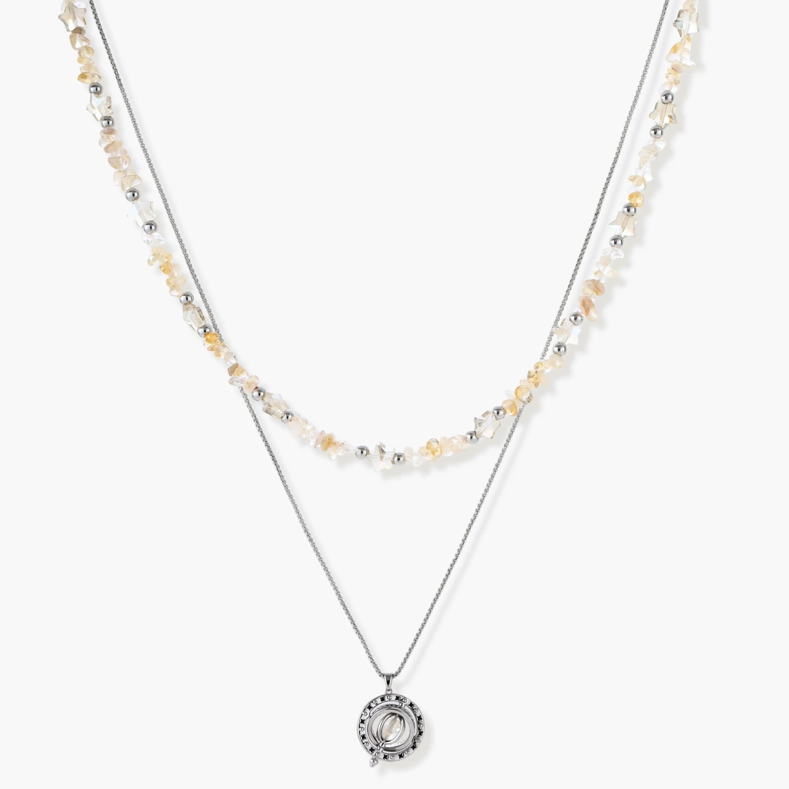 Two-layer necklace with natural stone chips and eco-brass beads, featuring a circular wrapped pendant on cream background.