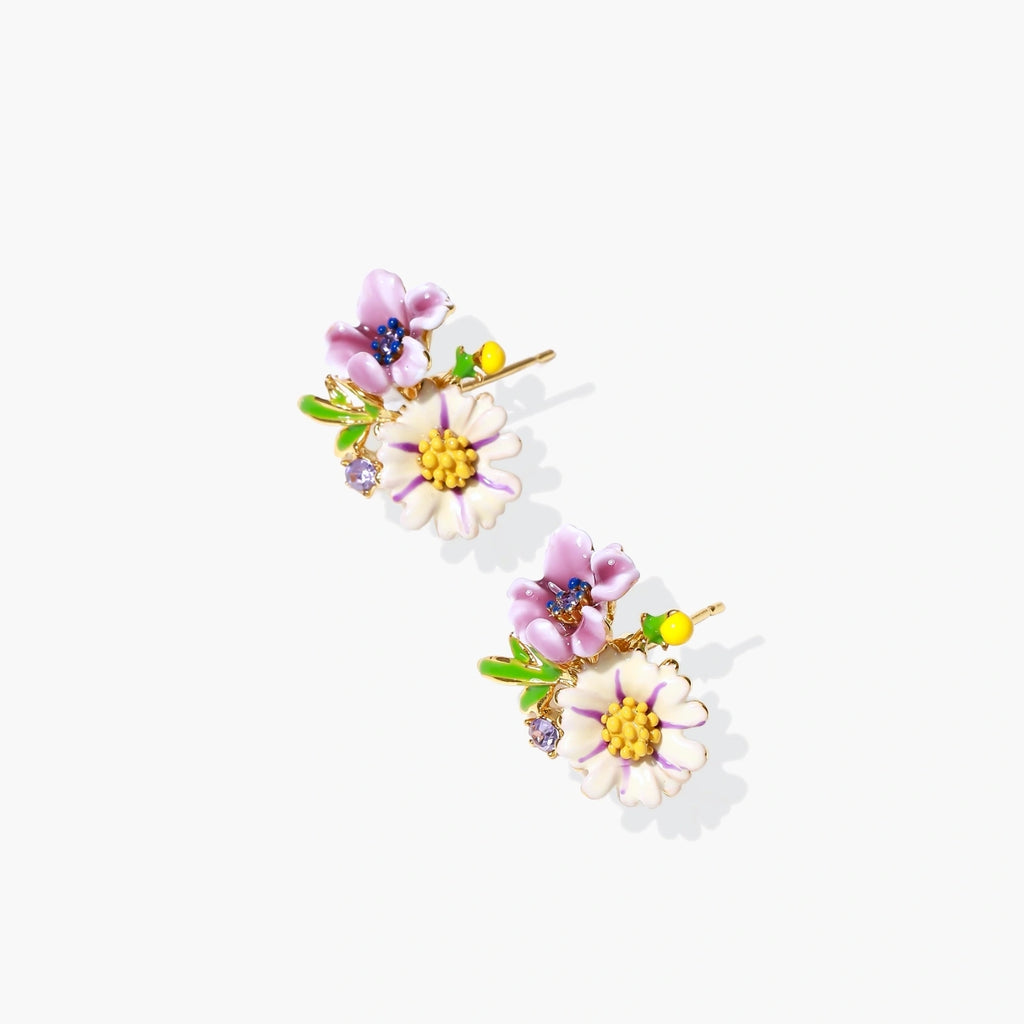 Cluster-style stud earrings with purple pansies, white daisies, yellow centers, and green leaves in glossy enamel finish