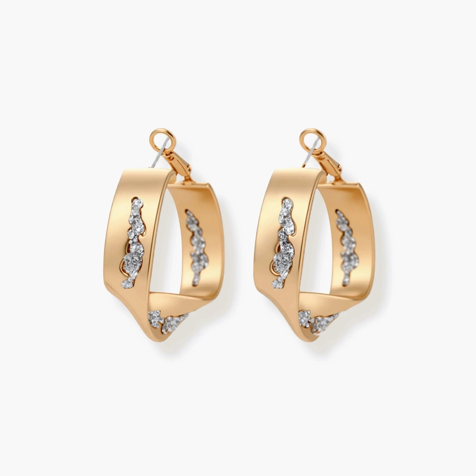 Gold circular pendant necklace with crystals on black cord paired with matching geometric hoop earrings on white background.