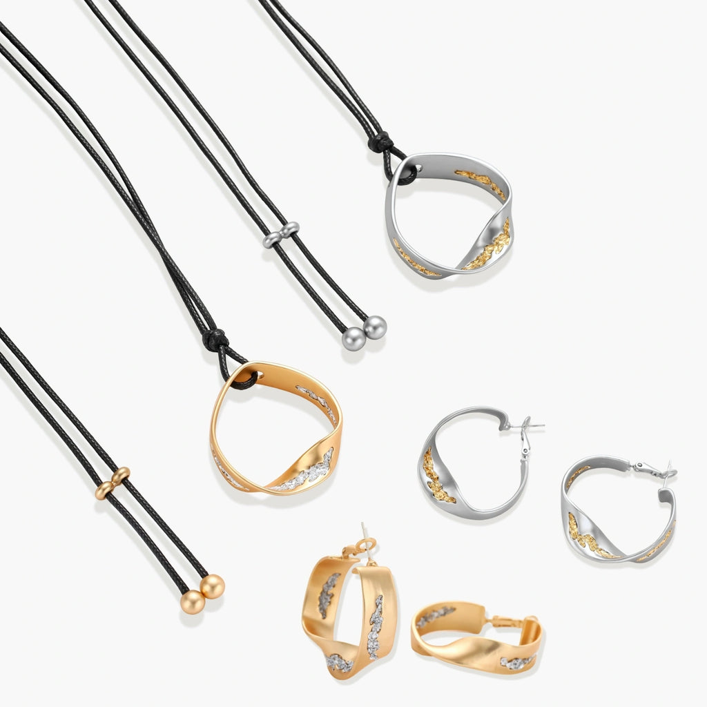 Gold circular pendant necklace with crystals on black cord paired with matching geometric hoop earrings on white background.