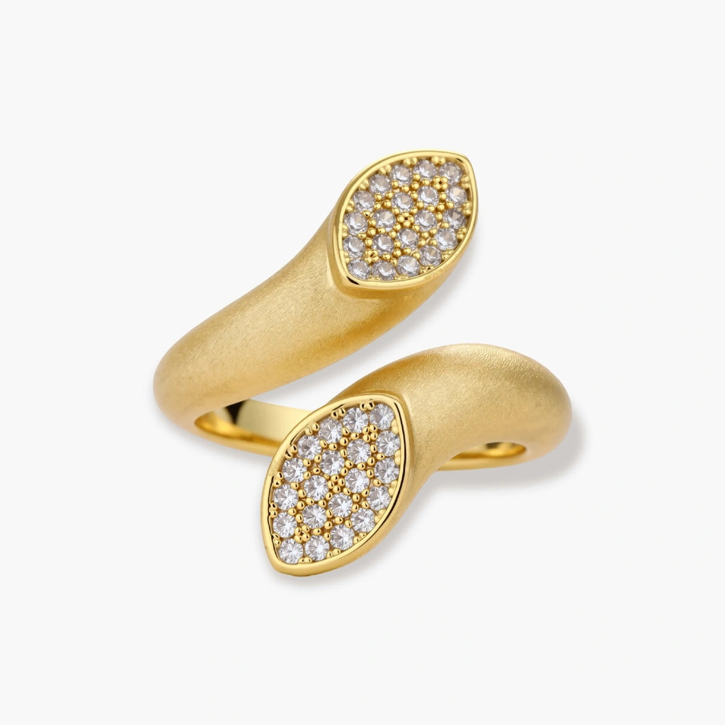 Open-band gold-plated ring with two oval pavé zirconia sections positioned at opposite ends, adjustable design